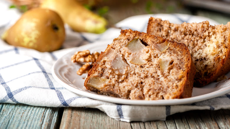 Pear bread with walnuts on plate 