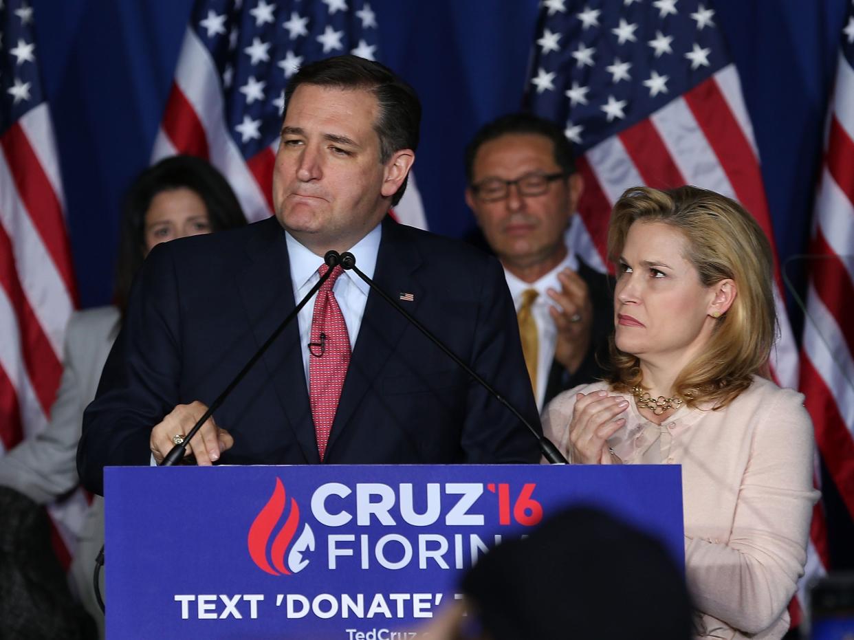 Republican presidential candidate, Sen. Ted Cruz (R-TX) announces the suspension of his campaign as wife Heidi Cruz looks on during an election night watch party at the Crowne Plaza Downtown Union Station on May 3, 2016 in Indianapolis, Indiana