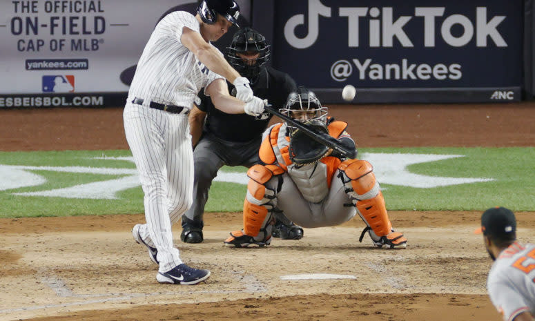 Jay Bruce swings at a pitch for the Yankees.
