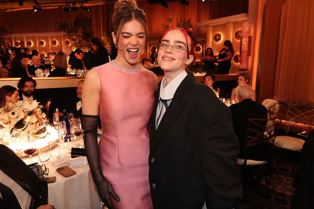 <p>Christopher Polk/Golden Globes 2024/Golden Globes 2024 via Getty </p> Hailee Steinfeld (left) and Billie Eilish at the 81st Golden Globe Awards