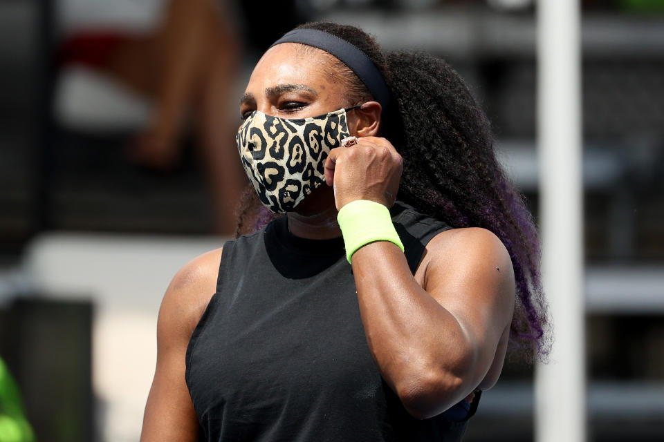 Serena Williams takes off her mask before her match against Venus Williams during Top Seed Open - Day 4 at the Top Seed Tennis Club on August 13, 2020 in Lexington, Kentucky. (Photo by Dylan Buell/Getty Images)