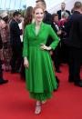 <p>The red-headed actress clashed her hair with a bright green Dior coat dress.<br><i>[Photo: Getty]</i> </p>