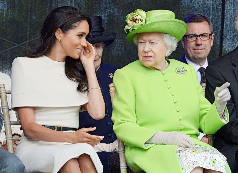 FILE PHOTO: Britain's Queen Elizabeth and Meghan The Duchess Of Sussex attend the opening of the Mersey Gateway Bridge in Runcorn