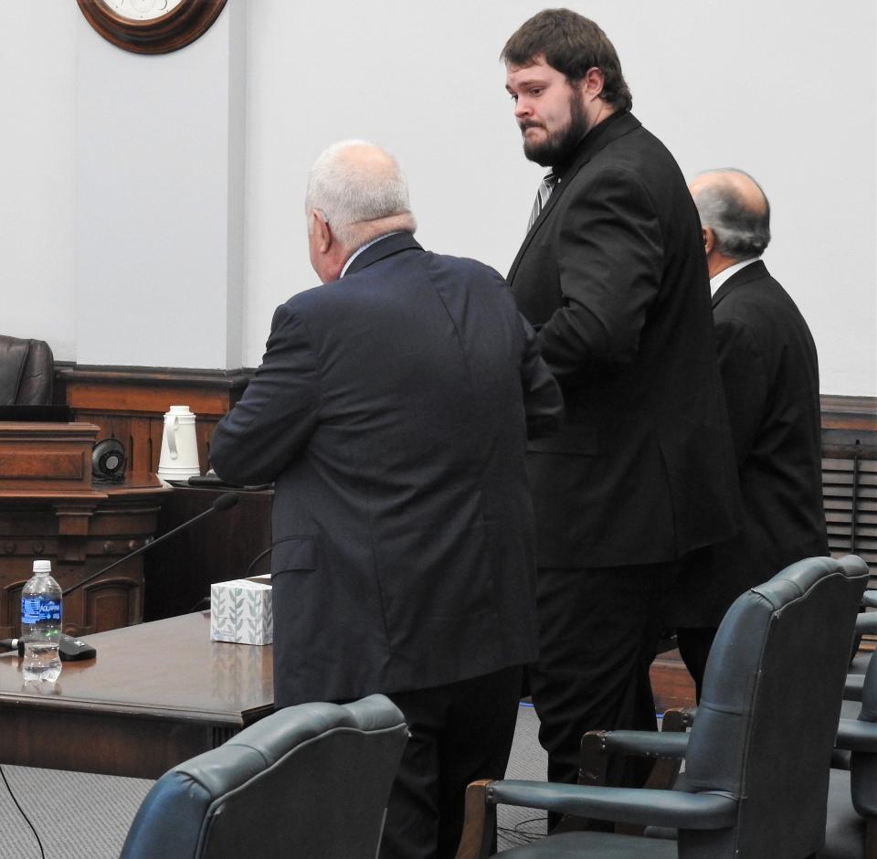 Joshua Sills with his attorneys appeared for a preliminary pretrial hearing Thursday in Guernsey County Common Pleas Court. The professional football player who was with the Philadelphia Eagles this past season is accused of first-degree felony counts of rape and kidnapping.