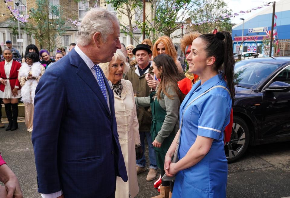 The residents of Albert Square get a shock when the royal couple grace the jubilee street party (BBC/PA) (PA Media)