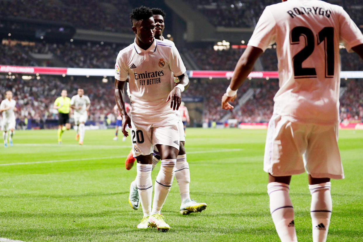 MADRID, SPAIN - SEPTEMBER 18: Vinicius Junior of Real Madrid celebrates 0-1 with Aurelien Tchouameni of Real Madrid  during the La Liga Santander  match between Atletico Madrid v Real Madrid at the Estadio Civitas Metropolitano on September 18, 2022 in Madrid Spain (Photo by David S. Bustamante/Soccrates/Getty Images)