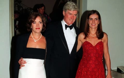 Lord Cecil Parkinson with daughters Mary, right, and Joanna, left, at a charity event in 1994  - Credit: Martin Keene/Press Association Images