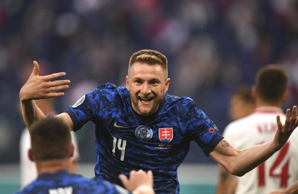 Slovakia's Milan Skriniar celebrates after scoring his side's second goal during the Euro 2020 soccer championship group E match between Poland and Slovakia at Gazprom arena stadium in St. Petersburg, Russia, Monday, June 14, 2021. (Kirill Kudryavtsev/Pool via AP)