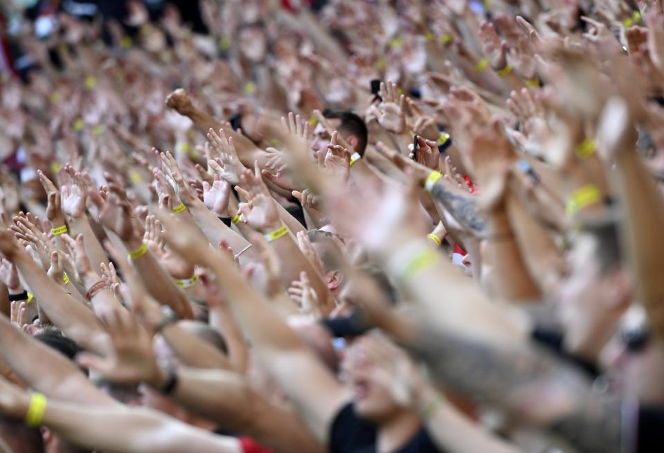 FILE - In this Tuesday, June 15, 2021 file photo supporters of Hungary before the Euro 2020 soccer championship group F soccer match between Hungary and Portugal at the Puskas Arena in Budapest, Hungary. (Tibor Illyes/Pool via AP, File)