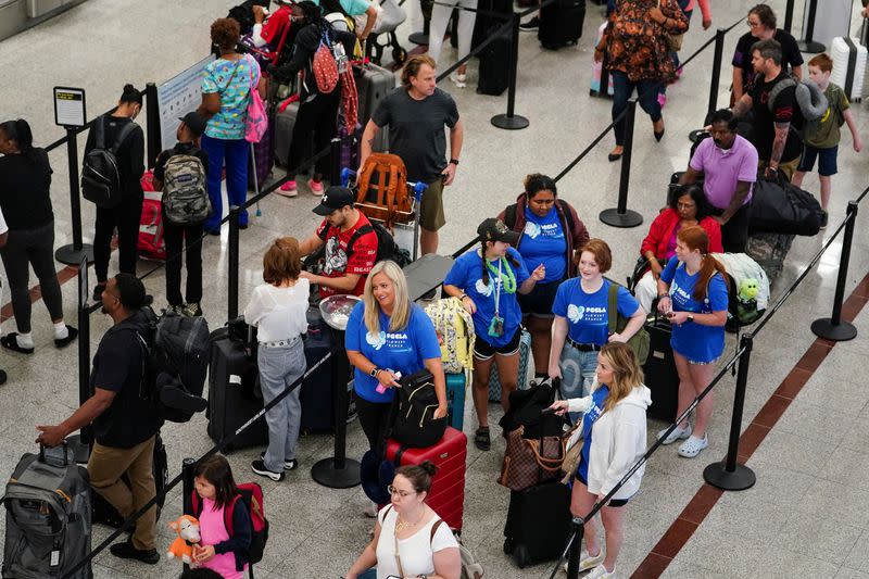 Passengers line up before their flights at Hartsfield-Jackson Atlanta International Airport