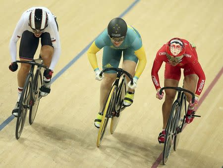 2016 Rio Olympics - Cycling Track - Repechage - Women's Sprint 1/8 Repechages - Rio Olympic Velodrome - Rio de Janeiro, Brazil - 15/08/2016. Miriam Welte (GER) of Germany, Anna Meares (AUS) of Australia and Zhong Tianshi (CHN) of China compete. REUTERS/Matthew Childs