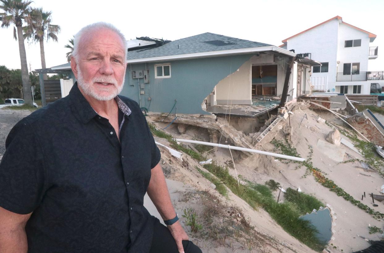 Phil Martin stands in front of one of his properties in Wilbur-By-The-Sea on Sept. 15, 2023. Hurricane Ian destroyed the property.