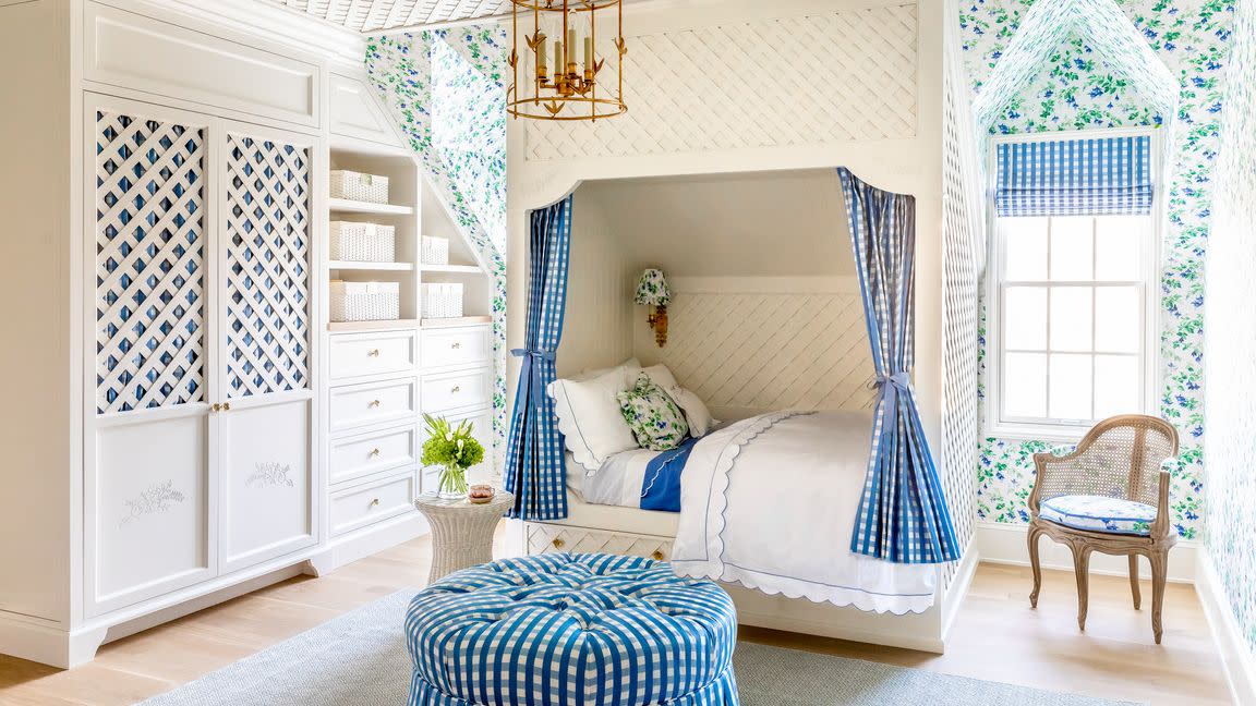 cara fox chose a sweet floral schumacher wallpaper and trelliswork to make this bed between the dormers feel like a secret garden