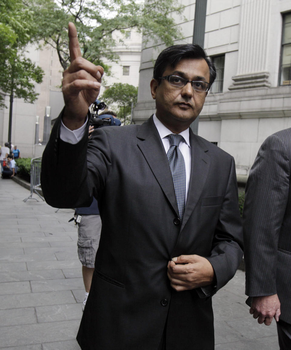 Anil Kumar, a former financial consultant-turned-government witness, leaves Federal Court in New York, Thursday, July 19, 2012. Kumar was sentenced Thursday to two years of probation after prosecutors credited him with helping convict a pair of Wall Street titans on insider trading charges. (AP Photo/Richard Drew)