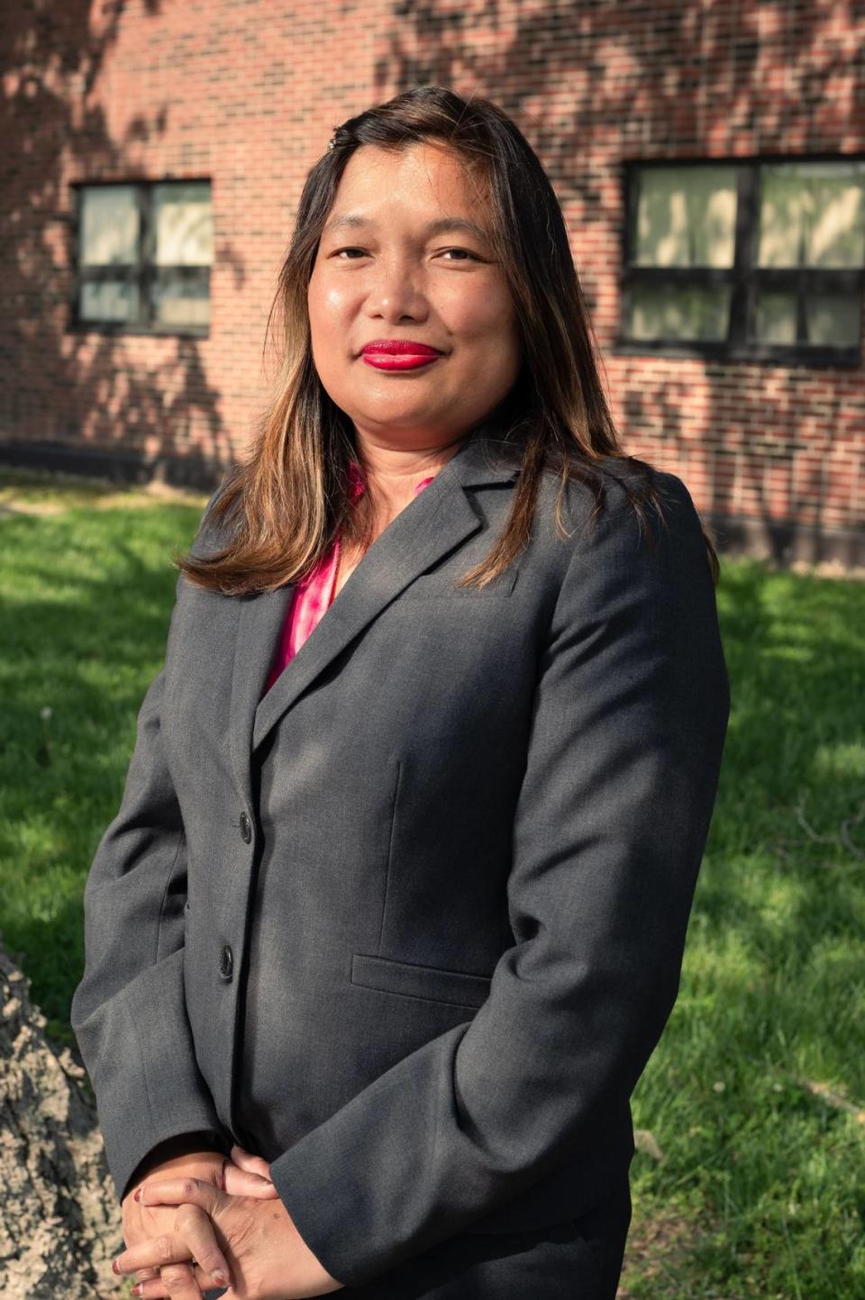 Chona Retrio Jones poses for a photo during Asian American Islander Pacific Heritage Month on Scott Air Force Base. AAPIHM is observed during the month of May in the United States to celebrate the achievements and culture of Asian and Pacific Islander Americans.