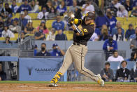 San Diego Padres' Victor Caratini hits a solo home run during the second inning of a baseball game against the Los Angeles Dodgers Wednesday, Sept. 29, 2021, in Los Angeles. (AP Photo/Mark J. Terrill)