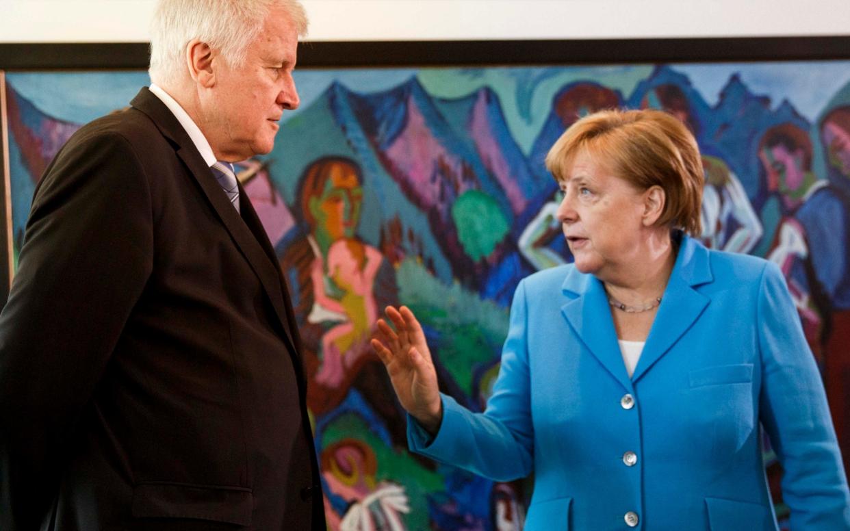 Chancellor Merkel's Coalition is at risk after clashes with her Interior Minister, Horst Seehofer over Germany's refugee policy. - Getty Images Europe