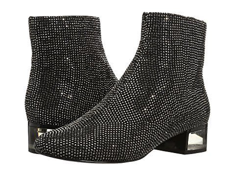 <strong><a href="https://www.zappos.com/marty/p/aldo-sparkle-silver/product/8987884/color/632" target="_blank">Get the boots</a></strong>