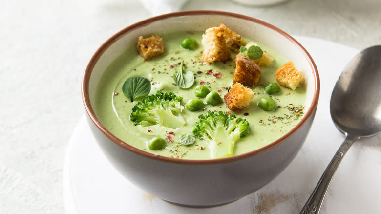 Pea soup with croutons and broccoli 