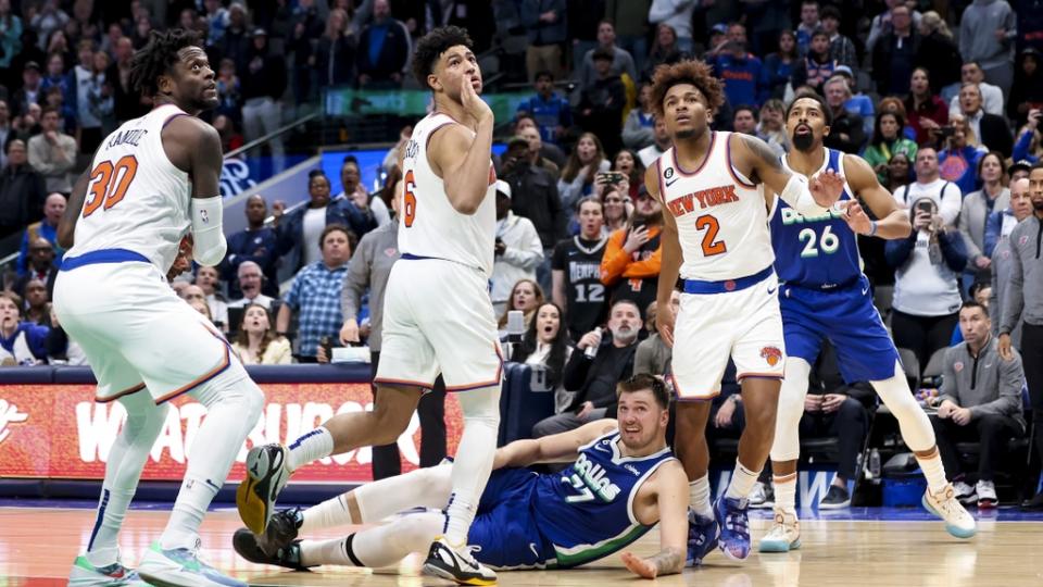 Dec 27, 2022; Dallas, Texas, USA; Dallas Mavericks guard Luka Doncic (77) reacts after scoring during the fourth quarter against the New York Knicks at American Airlines Center.