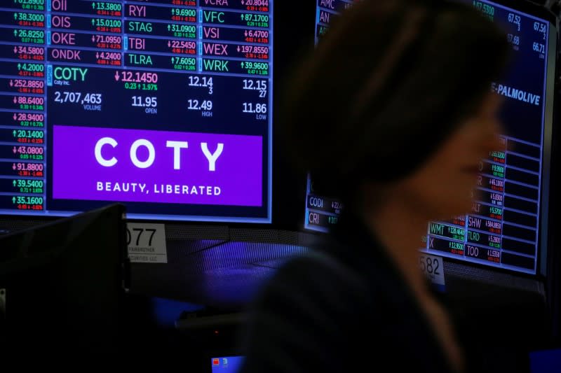 FILE PHOTO: A screen displays the logo and trading information for Coty Inc at the NYSE in New York