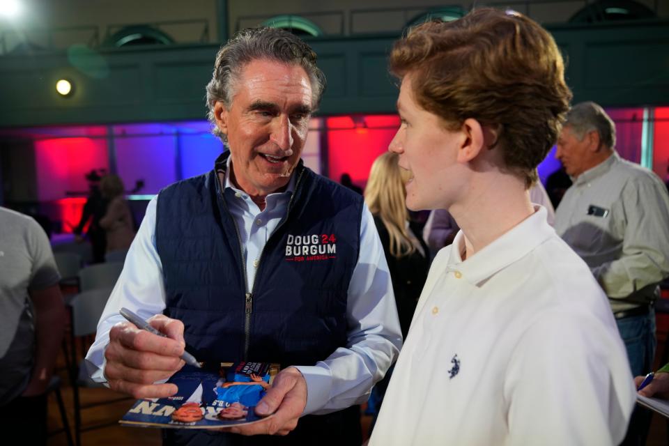 Republican presidential candidate Doug Burgum greets supporters after the Seacoast Media Group and USA TODAY Network 2024 Republican Presidential Candidate Town Hall Forum.