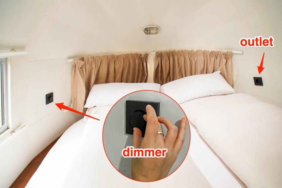 The dimmer and an outlet by the bed.