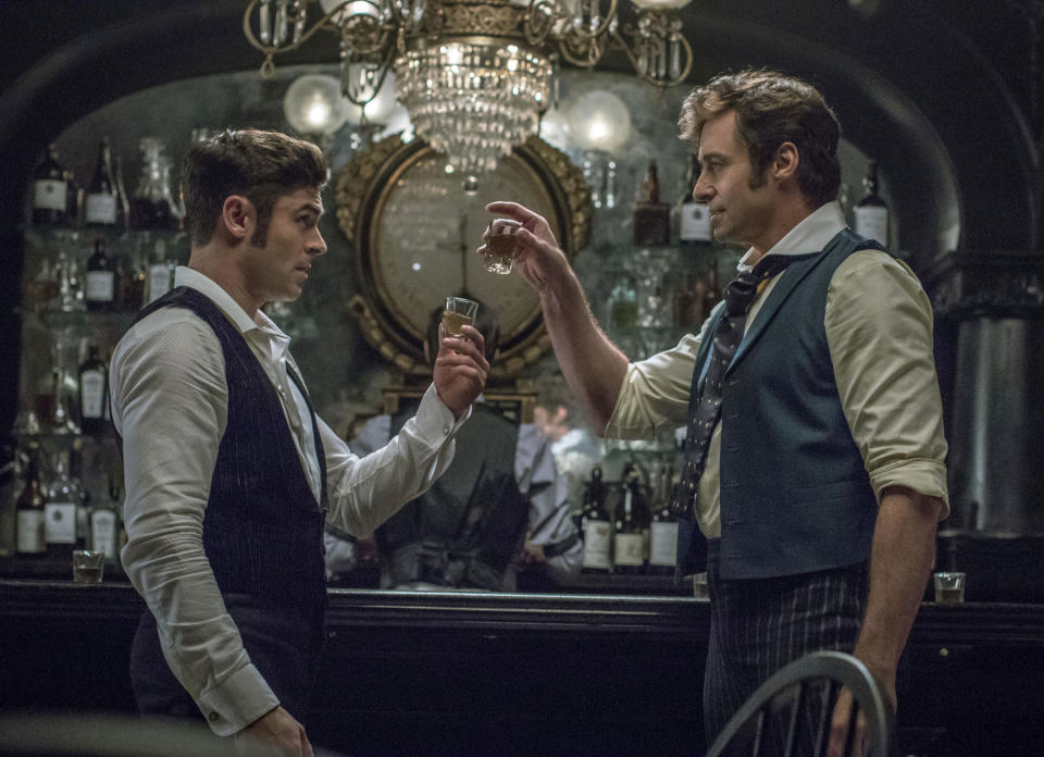 Zac Efron, left, and Hugh Jackman in a scene from ‘The Greatest Showman.’ (Niko Tavernise/Twentieth Century Fox via AP)