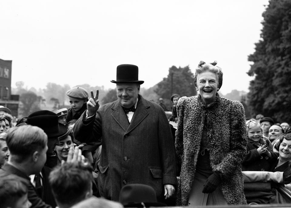 FILE - In this May 26, 1945 file photo, Britain's Prime Minister Winston Churchill and his wife Clementine tour Churchill's constituency of Woodford, in Essex, England, as part of the Conservative's General Election campaign. Britain is facing the most testing and significant, some would say tortuous, period in its modern history since World War II. The polarized electorate now has a critical choice to make _but it seems unlikely the result, whatever it may be, will heal deep and toxic divisions that could last a generation or more. (AP Photo/Eddie Worth, File)