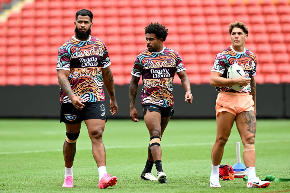 Payne Haas, Ezra Mam and Reece Walsh during training.