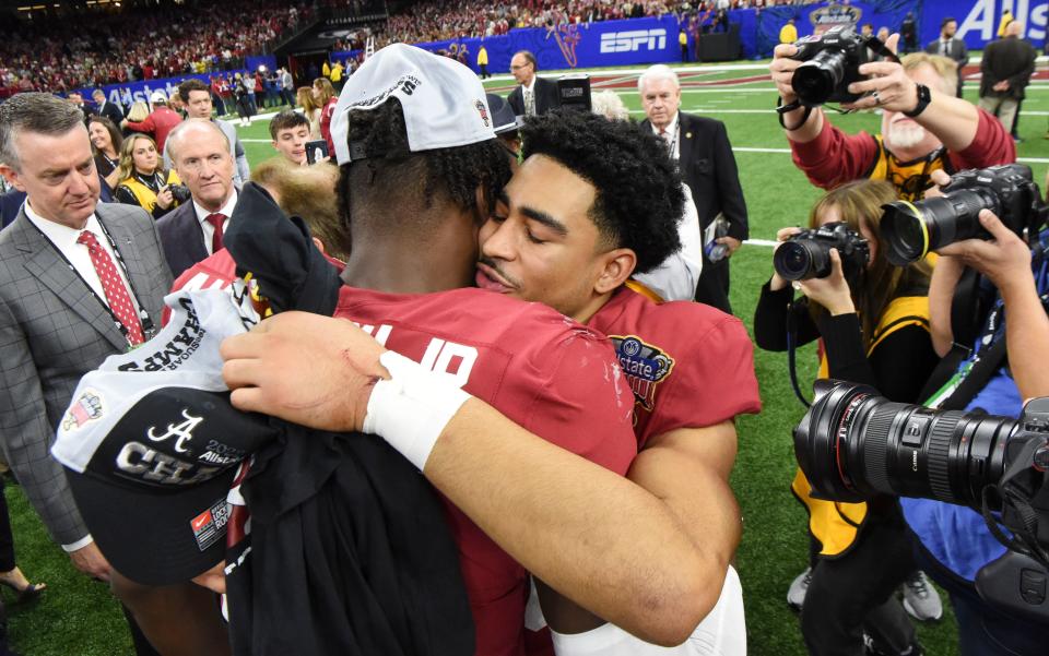 Dec 31, 2022; New Orleans, LA, USA;  Alabama quarterback Bryce Young (9) hugs Alabama linebacker Will Anderson Jr. (31) after the 2022 Sugar Bowl at Caesars Superdome. Alabama defeated Kansas State 45-20. Both players opted to play in the game which is likely the last in each manÕs college career. Mandatory Credit: Gary Cosby Jr.-USA TODAY Sports