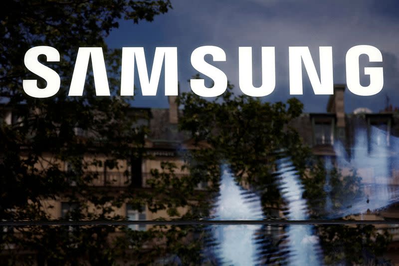 FILE PHOTO: The Samsung logo is pictured at the Samsung Galaxy innovation space on the Champs-Elysees avenue in Paris