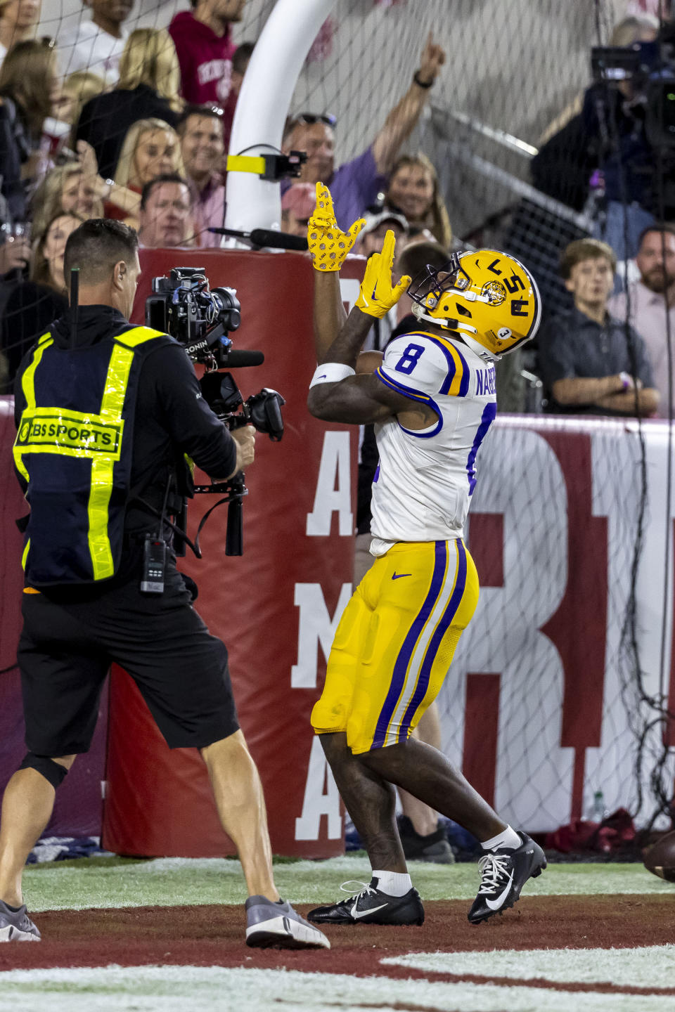 LSU wide receiver Malik Nabers (8) celebrates his touchdown against Alabama during the first half of an NCAA college football game, Saturday, Nov. 4, 2023, in Tuscaloosa, Ala. (AP Photo/Vasha Hunt)