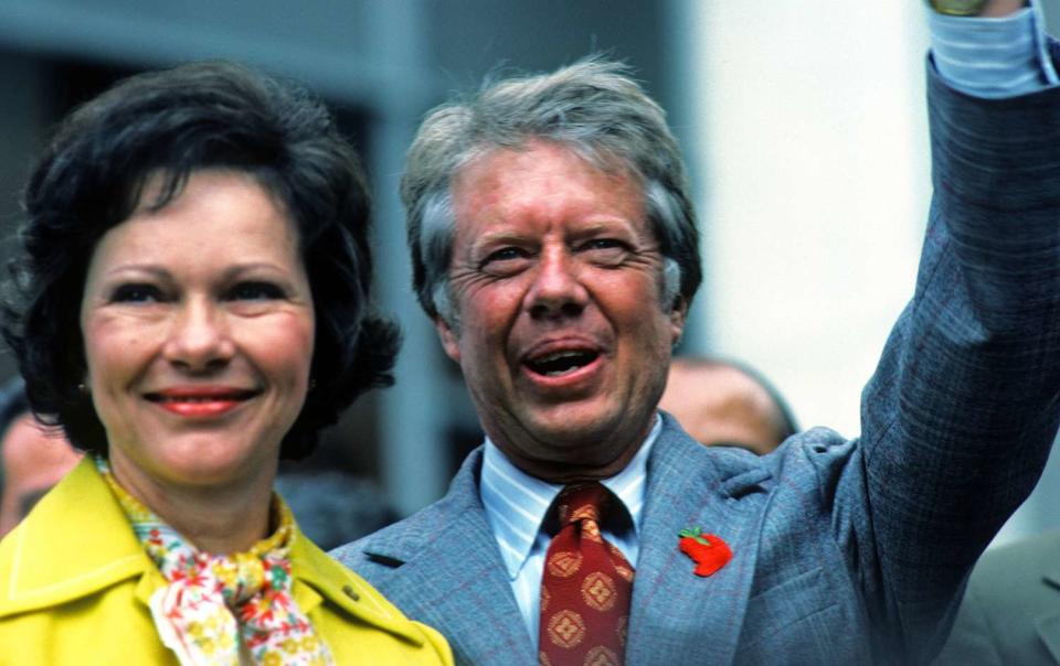 Jimmy Carter with wife Rosalynn speaking in New York on July 12, 1976 in New York, New York