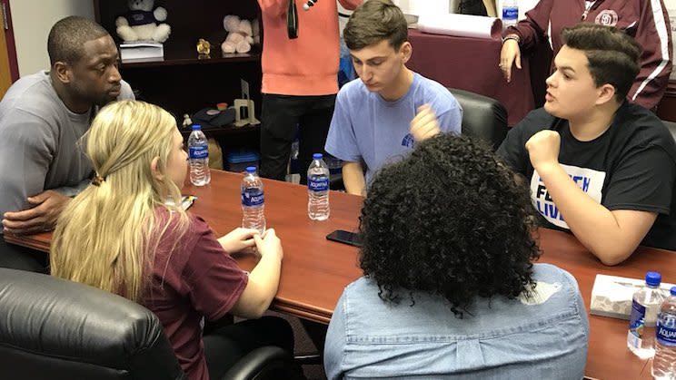 Miami Heat star Dwyane Wade (left) met with Stoneman Douglas students on Wednesday. (@RobertwRuncie on Twitter)