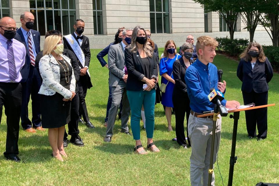 Dylan Brandt speaks at a news conference outside the federal courthouse in Little Rock, Ark., July 21, 2021. Brandt, a teenager, is among several transgender youth and families who are plaintiffs challenging a state law banning gender confirming care for trans minors.  A federal judge struck down Arkansas' first-in-the-nation ban on gender-affirming care for children as unconstitutional Tuesday, June 20, 2023.