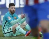 Football Soccer - Atletico Madrid v Barcelona - Spanish La Liga Santander - Vicente Calderon Stadium, Madrid, Spain, 26/02/17 Barcelona's Lionel Messi reacts. REUTERS/Susana Vera