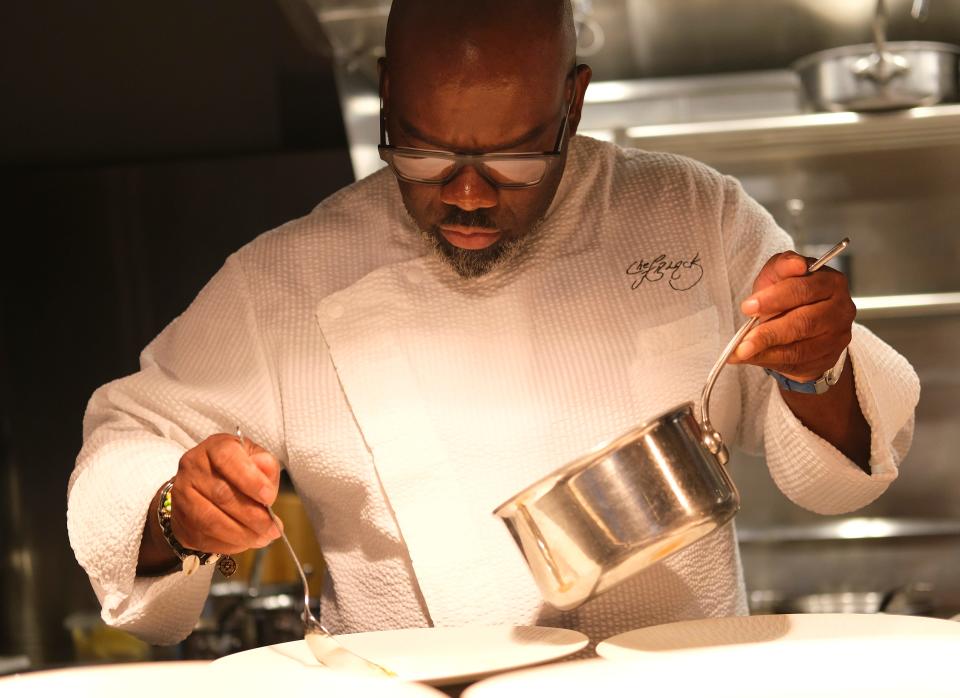 Chef Andrew Black working in the kitchen during dinner service at Grey Sweater on Sept. 9, 2021.