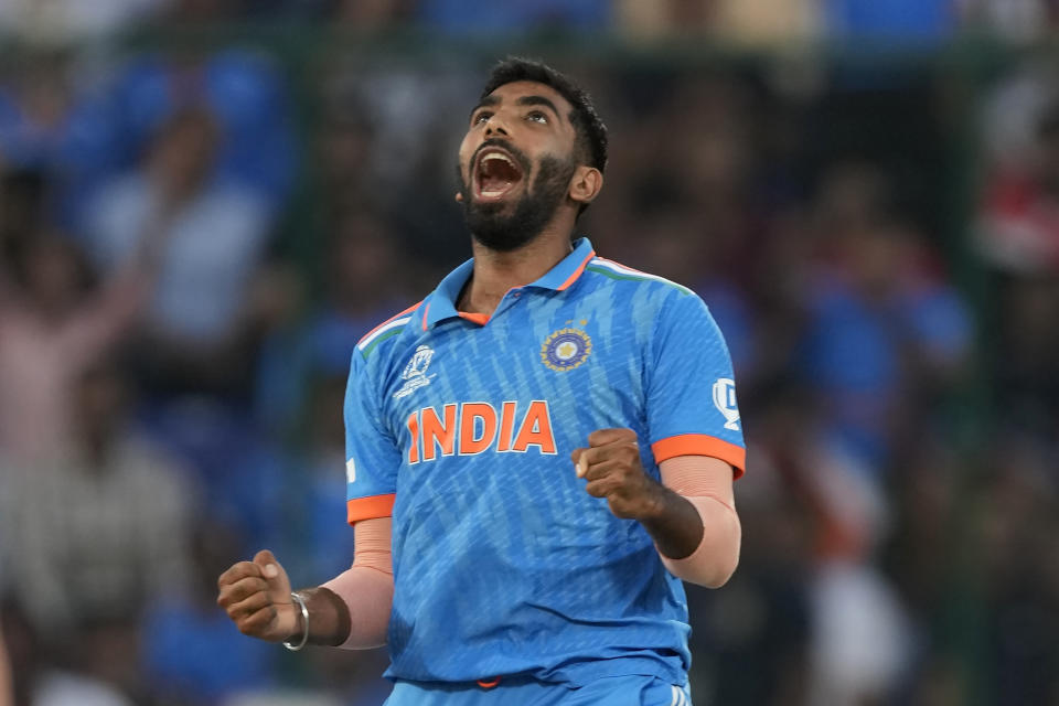 India's Jasprit Bumrah celebrates the wicket of Afghanistan's Mohammad Nabi during the ICC Men's Cricket World Cup match between Afghanistan and India in New Delhi, India, Wednesday, Oct. 11, 2023. (AP Photo/Manish Swarup)