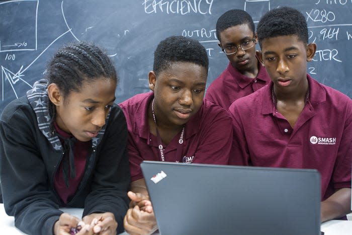 A group of students tried to solve an equation on a laptop during the SMASH (Summer Math and Science Honors)  program at Morehouse College in Atlanta in 2017.