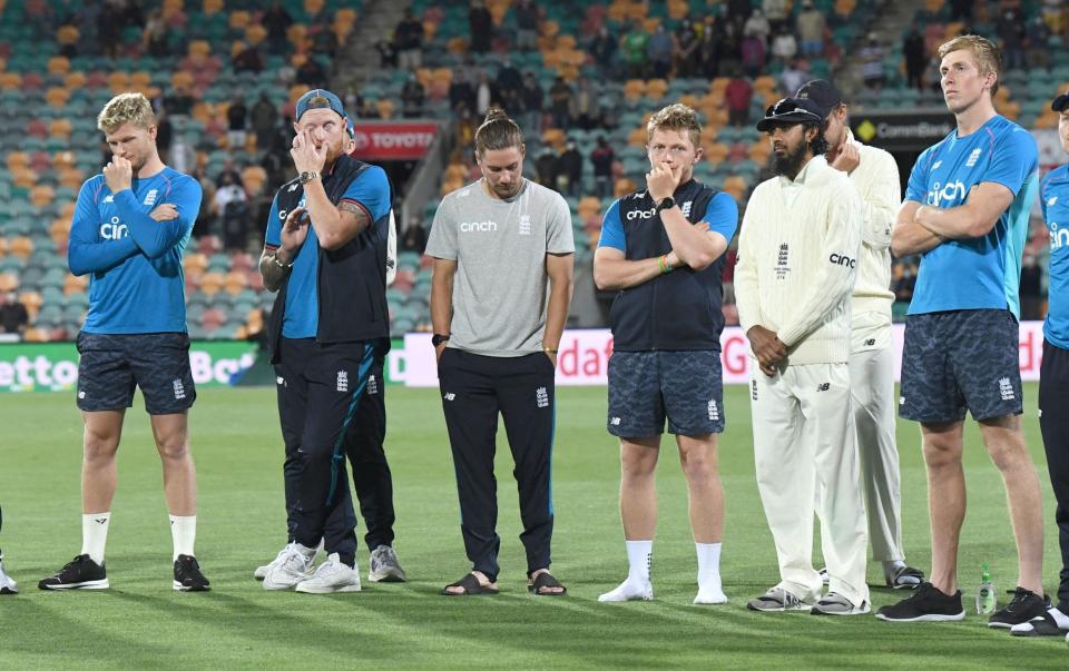 Forlorn expressions on the England team after their Ashes nightmare finally ends - PA