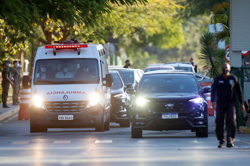 A presidential convoy with an ambulance transporting Brazil's President Jair Bolsonaro leaves the armed forces hospital (HFA) in Brasilia