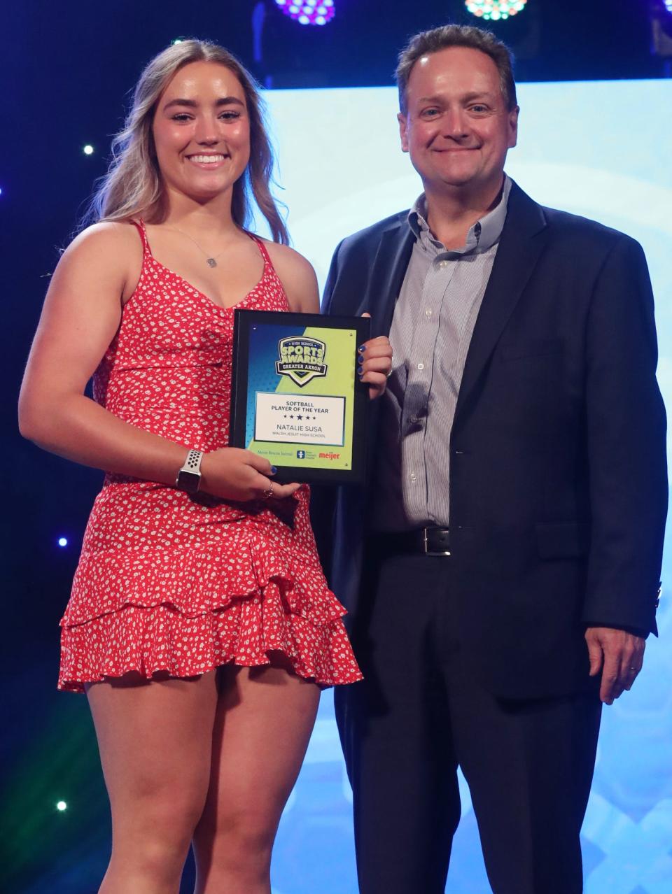 Walsh Jesuit's Natalie Susa Greater Akron Softball Player of the Year with Michael Shearer Akron Beacon Journal editor at the High School Sports All-Star Awards at the Civic Theatre in Akron on Friday.