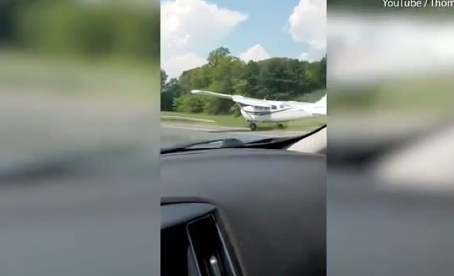 Dashcam footage captures moment plane lands on road