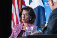 In this Tuesday, Sept. 28, 2021, photo Commerce Secretary Gina Raimondo speaks during a conversation with chairman David Rubenstein at The Economic Club of Washington. As President Joe Biden's de facto tech minister, Raimondo is tasked with ensuring the United States will be the world leader in computer chips. But there is a global shortage, creating a drag on growth and fueling inflation on the cusp of the 2022 elections. Raimondo is working to increase production of chips as well as solar panels and batteries to help the United States thrive. (AP Photo/Alex Brandon)