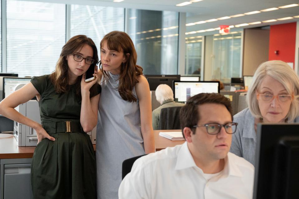 Jodi Kantor (Zoe Kazan, from left) and Megan Twohey (Carey Mulligan) make an important phone call as editors Rory Tolan (Davram Stiefler) and Rebecca Corbett (Patricia Clarkson) ready a story in the #MeToo journalism drama 'She Said.'