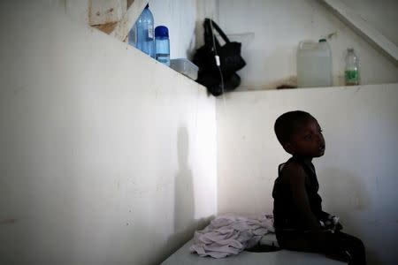 A child receives treatment at the cholera treatment center at the hospital after Hurricane Matthew hit Jeremie, Haiti. REUTERS/Carlos Garcia Rawlins