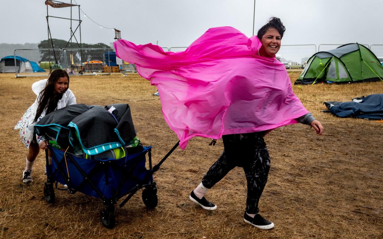 Camp Bestival was brought to an early finish after heavy rain and winds made it dangerous to erect stages and tents  - SWNS.com