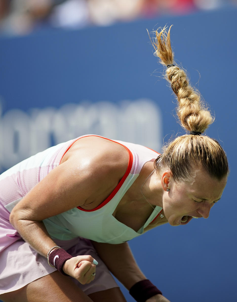 Petra Kvitova, of the Czech Republic, reacts after scoring a point against Garbine Muguruza, of Spain, during the third round of the U.S. Open tennis championships, Saturday, Sept. 3, 2022, in New York. (AP Photo/Eduardo Munoz Alvarez)