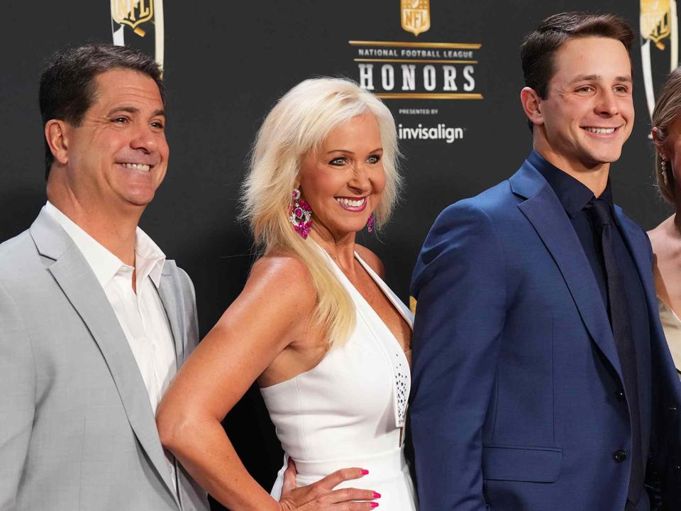 <p>Cooper Neill/Getty</p> Brock Purdy and his parents Carrie and Shawn Purdy, on the red carpet during NFL Honors on February 9, 2023 in Phoenix, Arizona.
